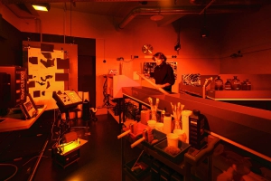 Traditional chemical darkroom in use - silver gelatin printing.